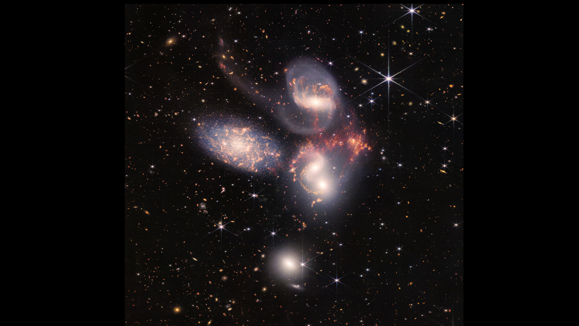 A detailed image of Stephan's Quintet, showing the grouping of five galaxies.
